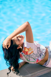 Shop this elegant floral sarong and cape sleeve shirt set by NovelaFashion—perfect resort wear for women. A breathable, all-size fit for stylish beach vacation outfits, beach club looks, and more. Inspired by Missoni beachwear.
